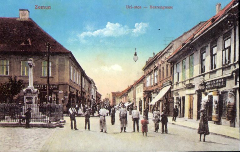 Kolorisana razglednica Gospodske ulice u Zemunu oko 1900, sa prolaznicima